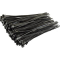 Bundle of black self-locking cable ties on a white background