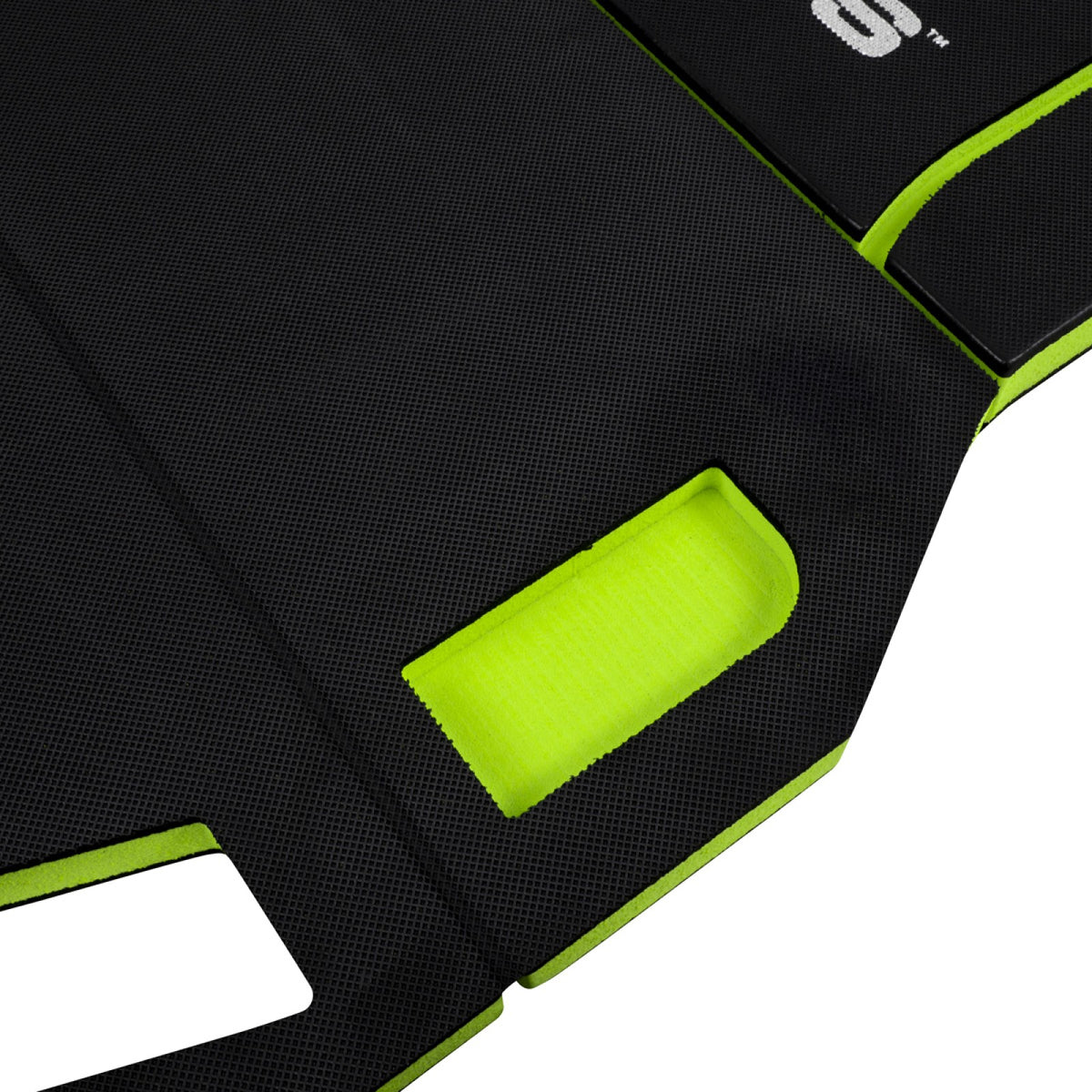 Close-up of Nemesis logo on folding kneeling mat with lime green border trim detail