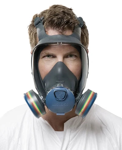 Person wearing Moldex full face respirator with cartridges fitted; filters shown are sold separately