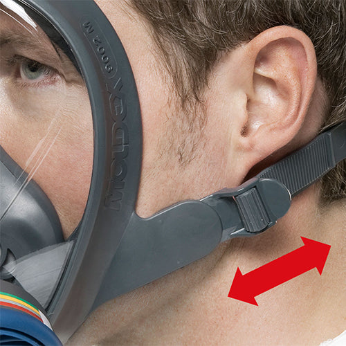 Close-up of adjustable head strap on Moldex full face respirator, with arrow showing tightening direction